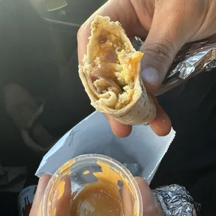 Sausage and bacon breakfast burrito