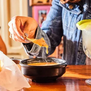 Queso pairs perfectly with Chuy's House Rocks 'Rita.
