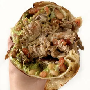 Crispy Flat Top Burrito w/ carnitas, pinto beans, jack cheese, guacamole, salsa, pico de gallo ($13.50)