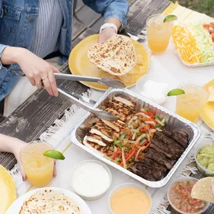 Fajita Meal Kits To Go - Your choice of chicken, beef or combo - enough for 4 people. Served with all the fixin's.