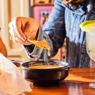 Queso pairs perfectly with Chuy&apos;s House Rocks &apos;Rita.