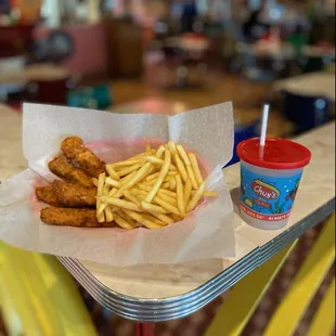 Kid's Chicken Tenders served with choice of rice and beans, fries or mac &amp; cheese and a drink!