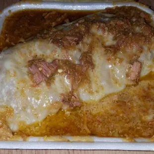 a chicken enchilada in a casserole dish
