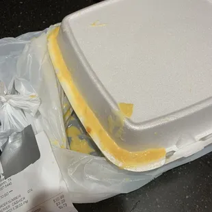 Container covered in queso.