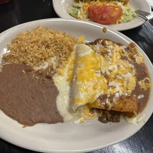 Beef, chicken, cheese enchiladas and beef taco