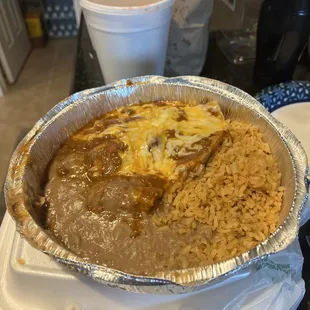 Comida Mexicana #1 with cheese enchilada and tamales rice and beans.