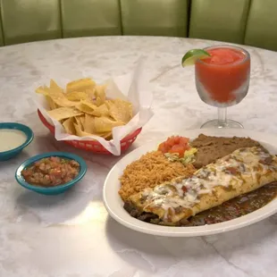 The Steak Burrito is stuffed with grilled steak and jack cheese, topped with Hatch Green Chile Sauce.