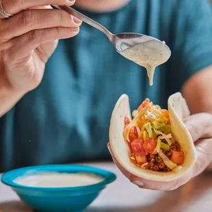 Soft Tacos - homemade flour tortillas with your choice of fajita chicken, seasoned ground beef or gua­camole. Served with all the fixin&apos;s.