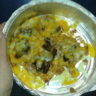 Just opened my to go order back at the office, 1/2 order of fajita nachos.... About 6 soggy, greasy chips. Very disappointed.