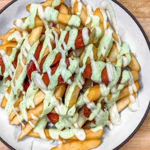 Ecuadorian sausage, fries, tree tomato alioli and Ecuadorian basil green sauce