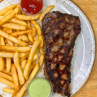 Steak seasoned in our marinate, fries, Ecuadorian salsa verde and ketchup