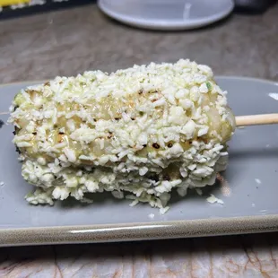 a plate of rice and vegetables