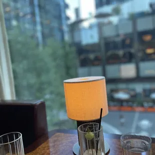 Gin tonic and a beer. Showcasing the nice view from the table.