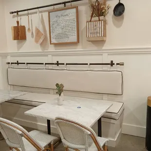 a table and chairs in a restaurant