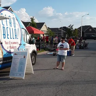 a man standing in front of a van