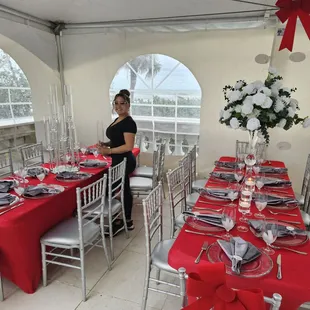 a woman setting a table