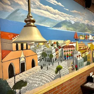 a mural of a town