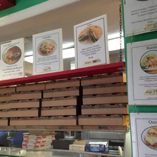 a display of pizzas