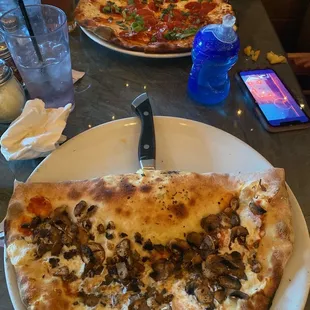 Vesuvio in the front and margherita with pepperoni in the back