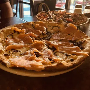 Al Salmone , ( foreground ) $19 &amp; Capricciosa ( background) $18