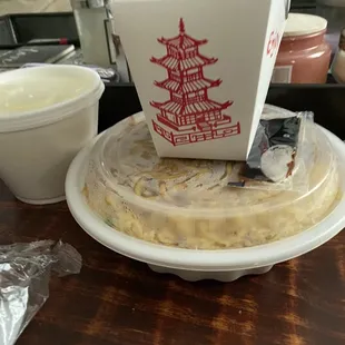 Chicken lo mien Noodle with chicken fried rice / the little cup is a egg drop soup.