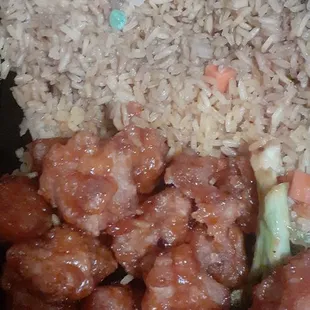 a plate of rice and meat
