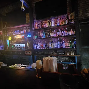 a bar with a lot of bottles