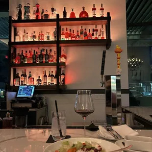 Bar view. Sangiovese &amp; Summer salad with no cheese per request.