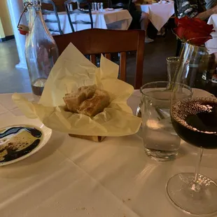 Glass of wine and bread oil and balsamic