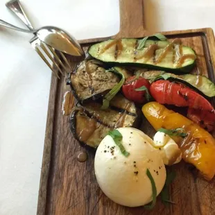 Start your meal off with some grilled veggies and burrata cheese.