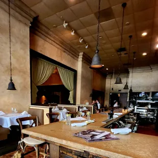 Bar counter and tables for two.