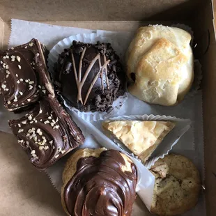 Chocolate peanut butter brownies, chocolate bomb, apple dumpling, baklava, coconut walnut cookie, chocolate cream puff