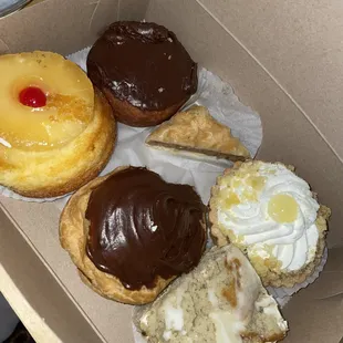 Chocolate doughnut, pineapple upside down cake, baklava, chocolate covered cream puff, banana bread, limoncello tart