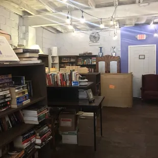 a room with a lot of books