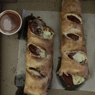 Had the Stromboli on 2nd visit. Excellent. 18 inches long and about 3 1/2 inches wide. Stuffed with meats and cheese.