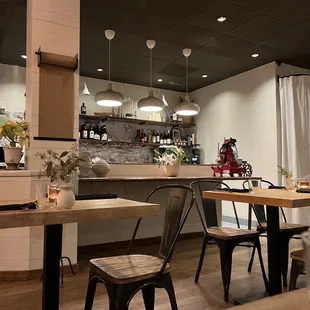 a view of a kitchen and dining area