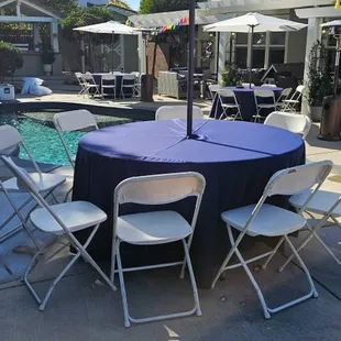 Round tables with umbrellas rentals