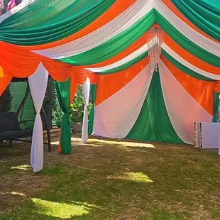 Canopy 15x20 feet long With orange green white draping