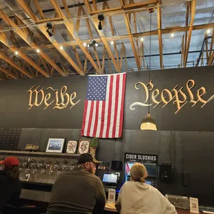 people sitting at a bar