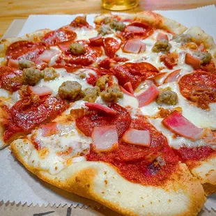 a pepperoni and sausage pizza