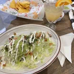 Barbacoa burrito and house margarita