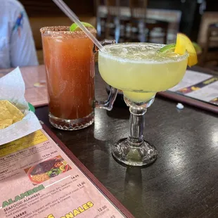 two cocktails on a table