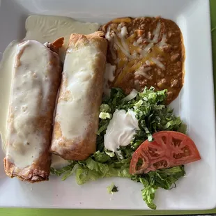 Chicken Chimichanga. Food is cold but plate is extremely hot so beware.