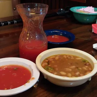 Salsa, somewhat bland and Mexican pintos served with very good chips