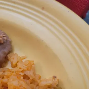 The gray about the rice looks like dirt or grime. You could smear it with your finger.