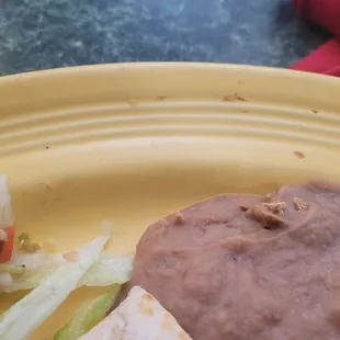 You can see the food that&apos;s caked on the plate that the machine probably could scrub off.