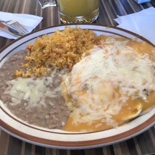 Huevos rancheros with beans and rice