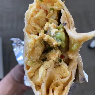 Inside of my huevos con chili burrito (added avocado and onion, no cheese).