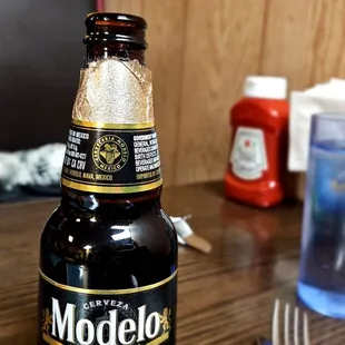 a bottle of beer on a table