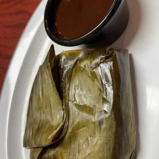 Amazing Chicken Mole tamale wrapped in plantain leaf's
